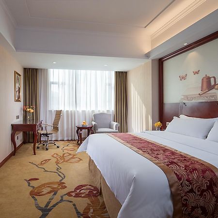 Vienna Hotel Zhongshan Guzhen Town Center Buitenkant foto