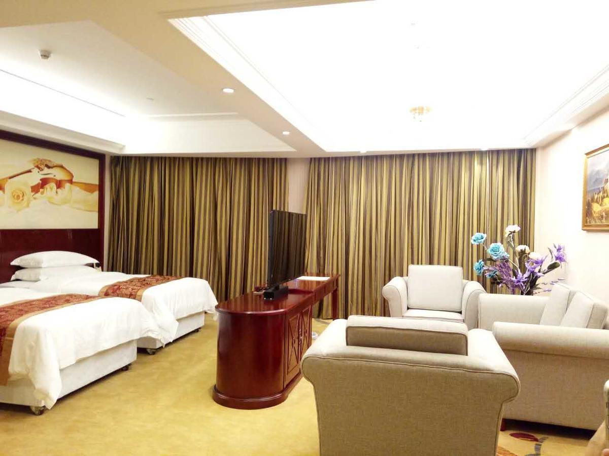 Vienna Hotel Zhongshan Guzhen Town Center Buitenkant foto