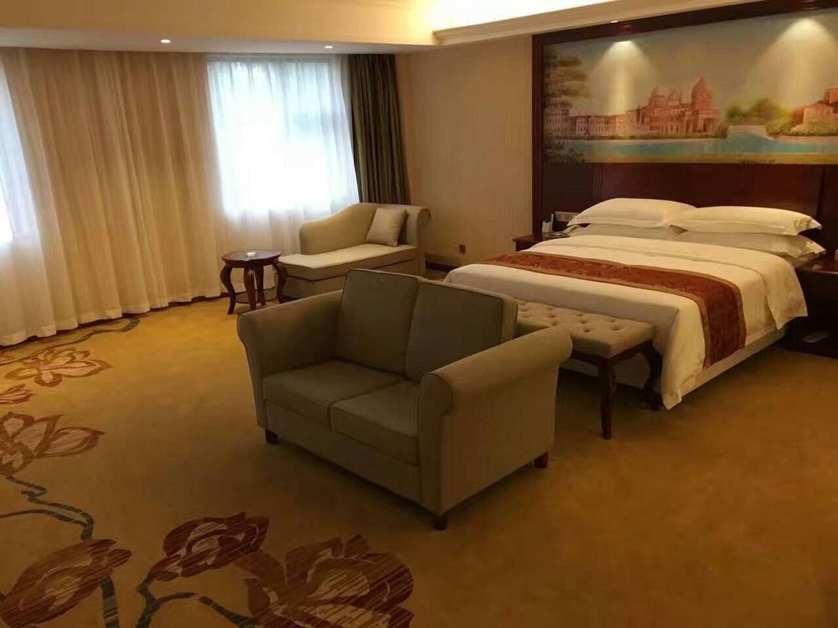 Vienna Hotel Zhongshan Guzhen Town Center Buitenkant foto