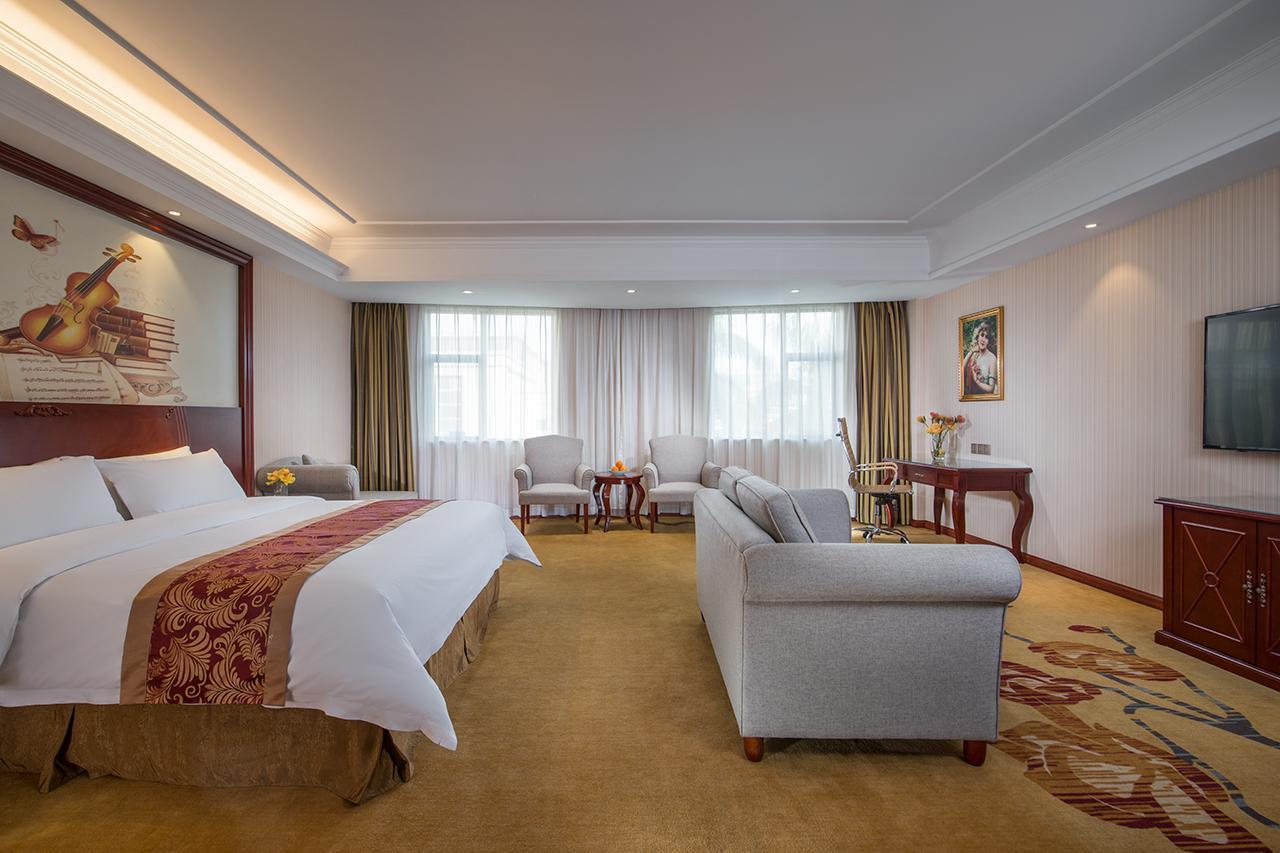 Vienna Hotel Zhongshan Guzhen Town Center Buitenkant foto