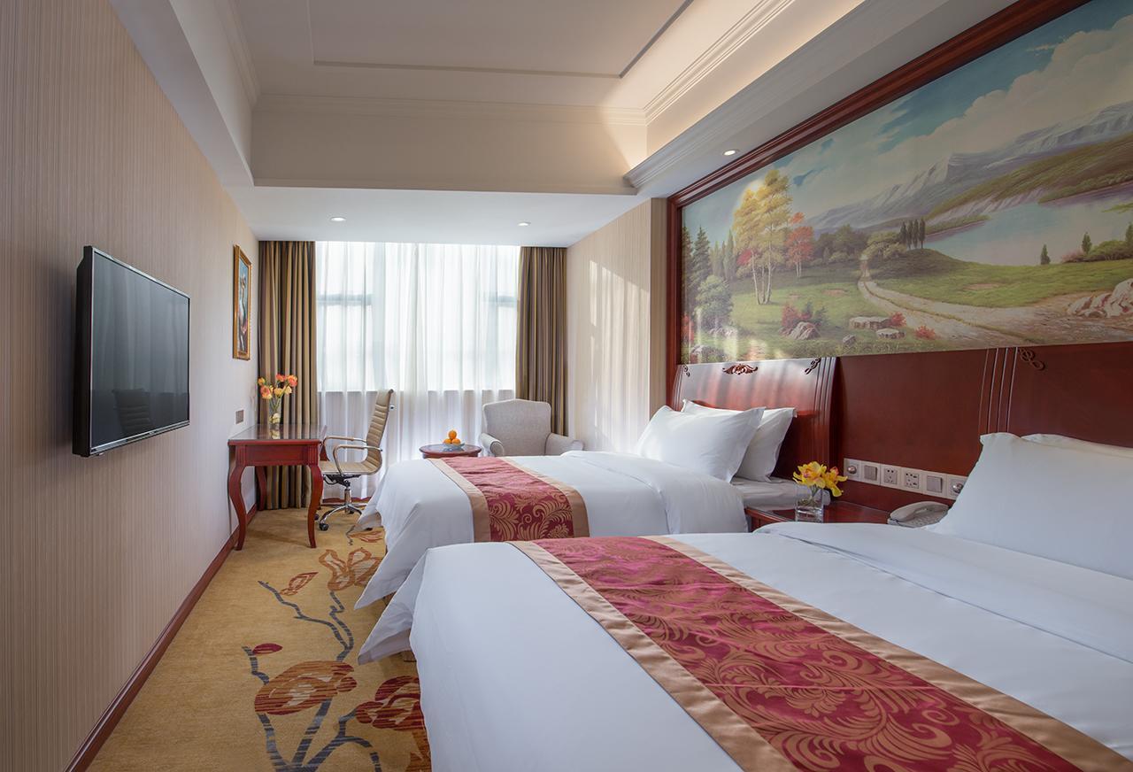 Vienna Hotel Zhongshan Guzhen Town Center Buitenkant foto